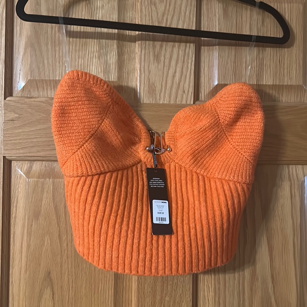 Orange camisole size M with decorative buckle in front